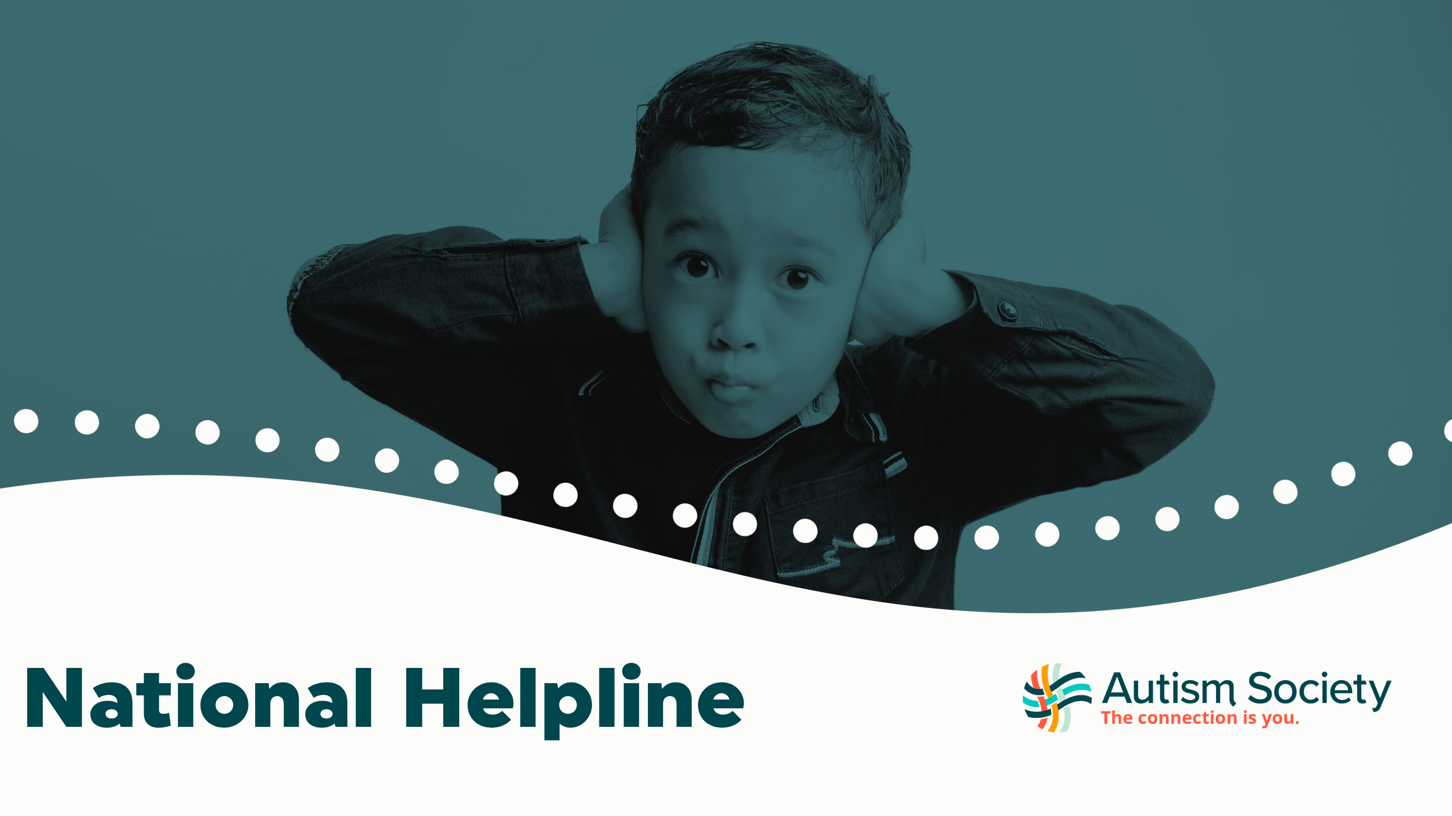 A young boycovering his ears.